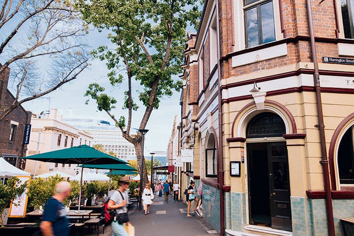 Cafes, galleries and bars lining the pedestrian walkway on Argyle Street, The Rocks. 
