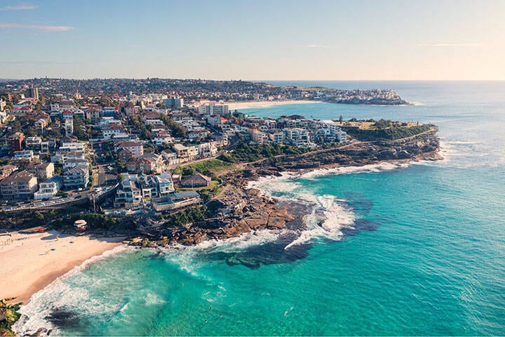 Aerial view of people walking along the Bondi to Coogee Coastal walk 