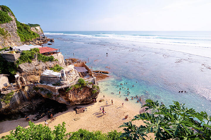 Uluwatu beach and surfing spot. Beautiful landscape with rock and ocean. Bali, Indonesia.